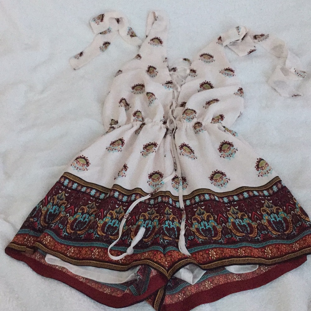 Backless, front lace up printed romper